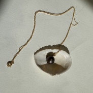 Pendant with natural pearl on a chain